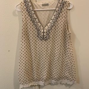 Cute blouse tank top! Worn a couple times.